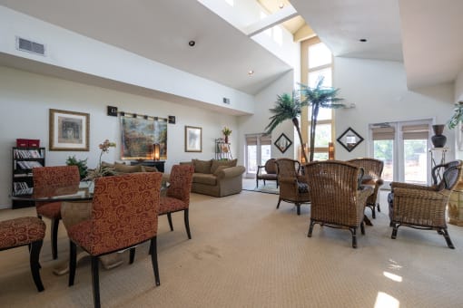 A relaxing clubhouse lounge with sofas and a coffee table.